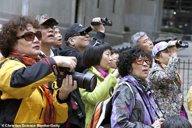 Chinese visitors travelling to the US have been warned not to quarrel or tussle in public after a man was arrested for getting into a fight with his wife on a street in New York (file photo) 