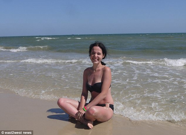 The horrific attack came after she had demanded a divorce following previous threats and violence - and the pair were living apart. Pictured: Margarita enjoying a day at the beach before the gruesome attack 