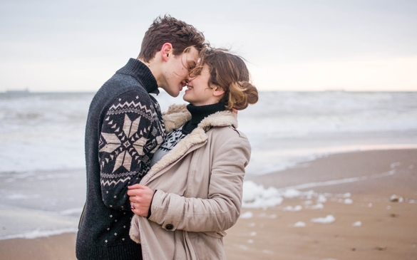 Young cute couple at sea in winter - What Does A Taurus Man Like About A Pisces Woman